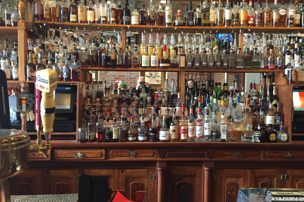 The historic interior of The Red Onion speakeasy