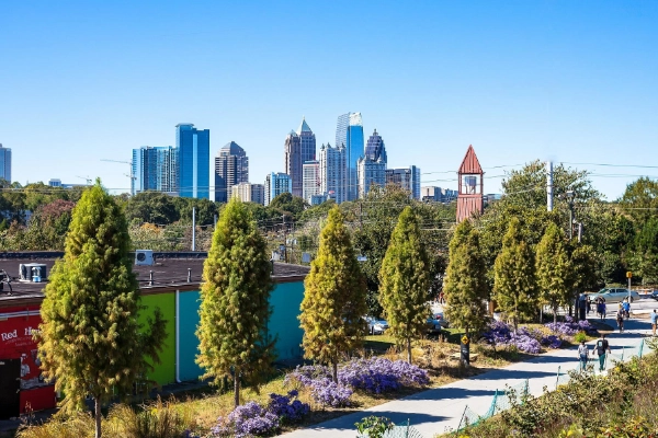 People enjoying the murals and path of the Atlanta BeltLine Eastside Trail
