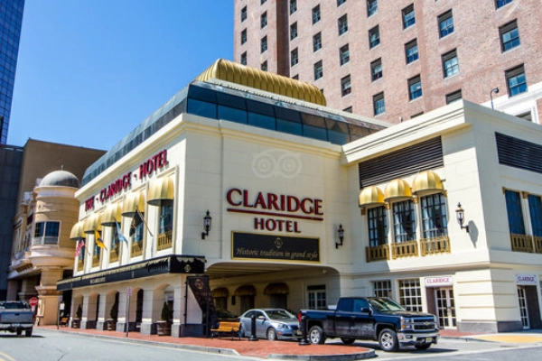 The historic, grand lobby of The Claridge Hotel