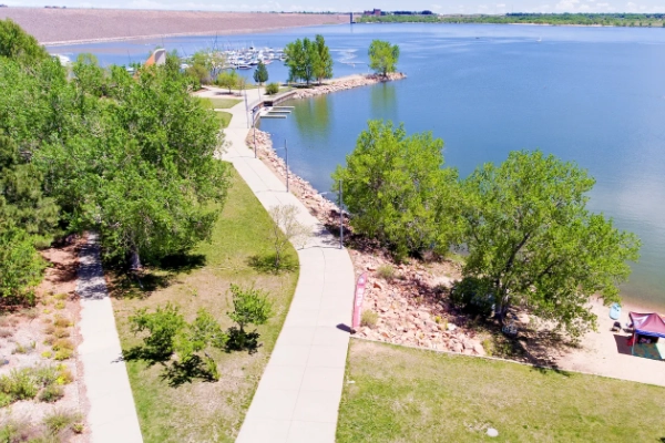 A campsite with a view of the reservoir at Cherry Creek State Park