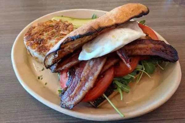 A flight of colorful pancakes from Snooze A.M. Eatery