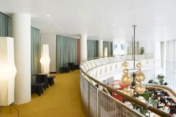 The mid-century modern lobby of The Durham Hotel