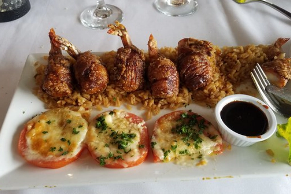A plate of crab cakes from Gaido’s seafood restaurant