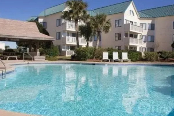 A simple, condo-style room at Gulf Shores Plantation