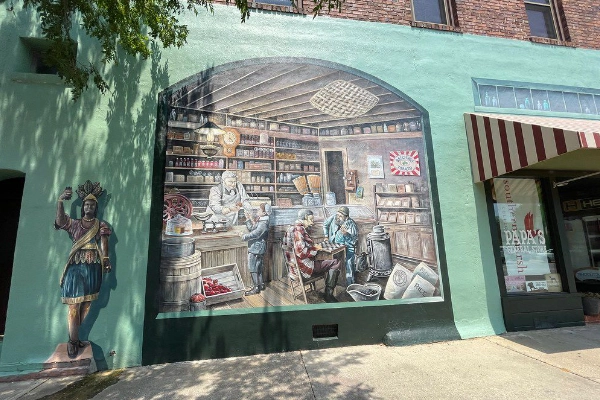 Colorful street art on Canal Road in the Waterway Village
