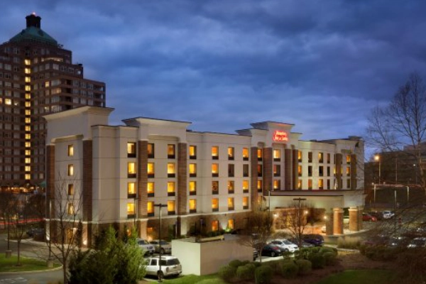 A modern room with a city view at the Hilton Hartford
