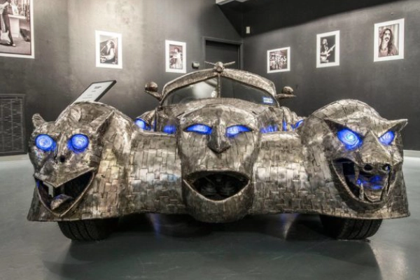 A decorated art car on display at the Art Car Museum