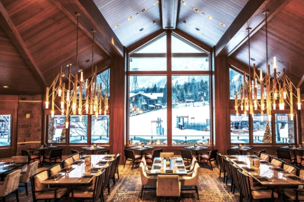 The luxurious alpine lobby of the Four Seasons Resort Jackson Hole