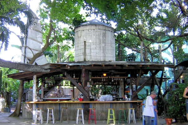 Tropical cocktails at the Tiki Bar at Blue Heaven with chickens roaming