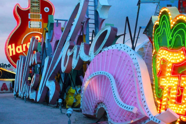 Vintage signs glowing at the Neon Museum boneyard