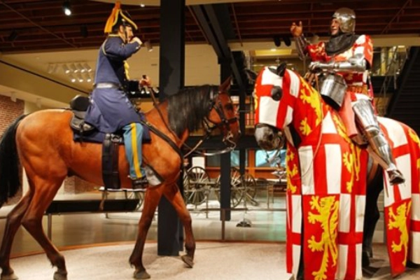 An exhibit of arms and armor at the Frazier History Museum