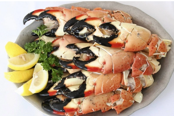 A plate of fresh stone crab claws from Joe’s Stone Crab