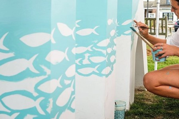 Colorful street art in the Montauk Village Arts District