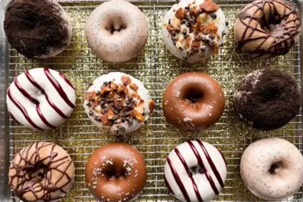 A tray of donuts and fried chicken from Federal Donuts
