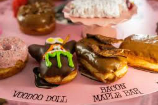 A box of quirky donuts from Voodoo Doughnut