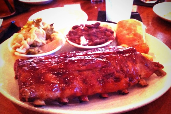 A plate of BBQ ribs from The Pit