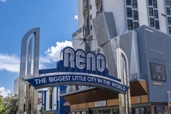 A modern room at the Whitney Peak Hotel with a view of the Reno Arch