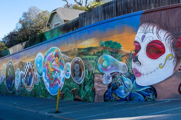 Vibrant Chicano street art on a wall in San Antonio's West Side