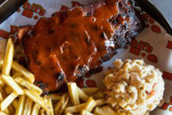 A rack of mesquite-grilled ribs from Phil’s BBQ