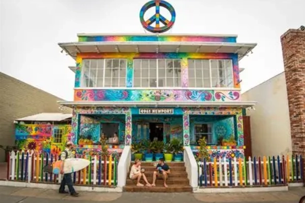 A colorful common area at USA Hostels in Ocean Beach