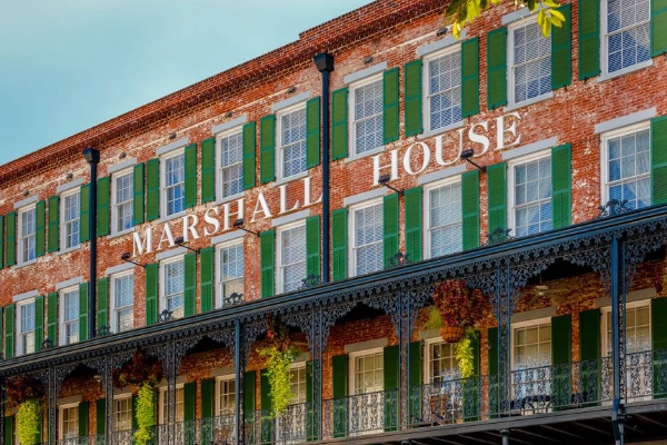The historic exterior of The Marshall House, a famously haunted hotel