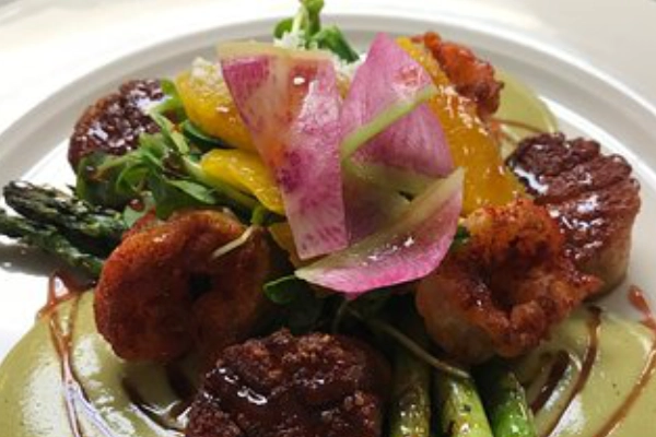A plate of elk tenderloin from Wild Sage Bistro
