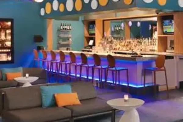 The retro, sci-fi themed lobby of The Moonrise Hotel