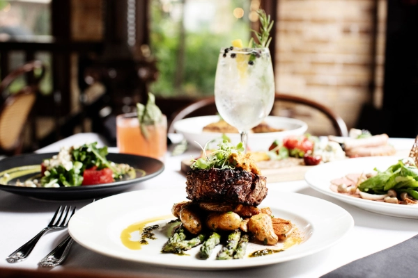 A dish of walleye on the Victorian patio at W.A. Frost & Company