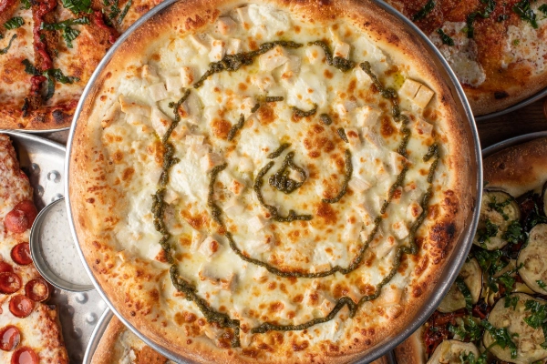 A slice of pepperoni pizza from Andolini’s Pizzeria