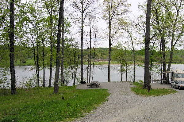 A campsite with a view of the lake at Keystone State Park