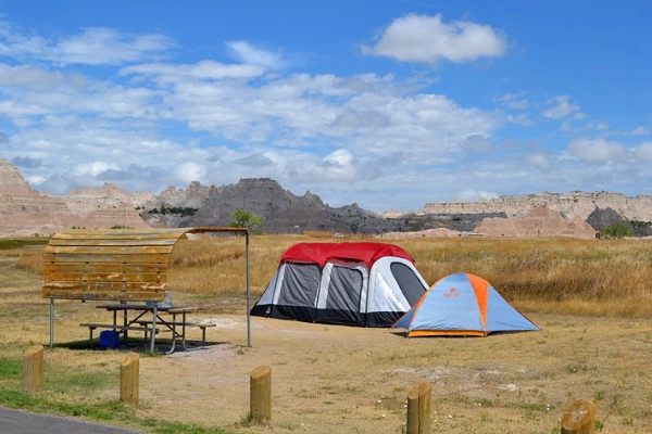 A campsite with a view of the buttes at Cedar Pass Campground