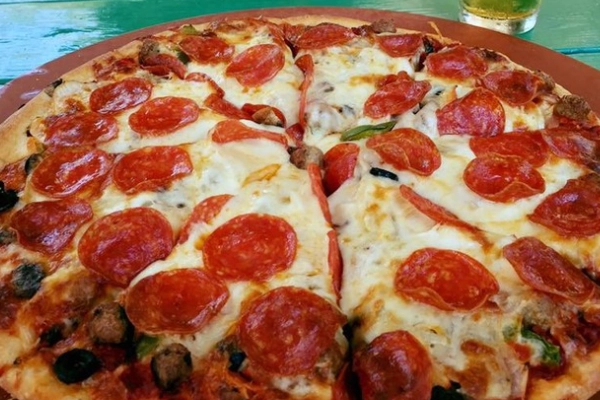 A slice of Cuban pizza from Mainland Pizza