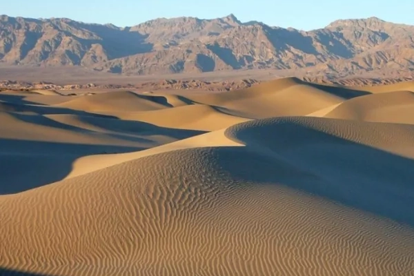 The rolling Mesquite Flat Sand Dunes at sunrise