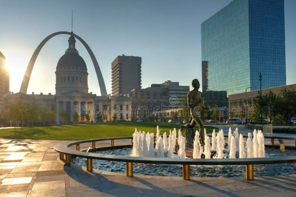 People enjoying the fountains and sculptures at Keiner Plaza