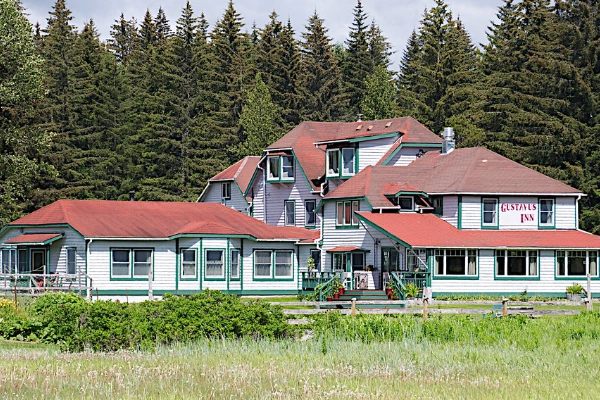 The rustic and charming exterior of the Gustavus Inn