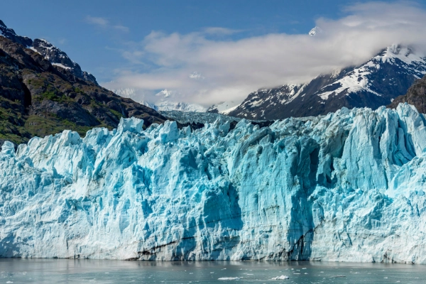 The massive tidewater Margerie Glacier calving into the sea