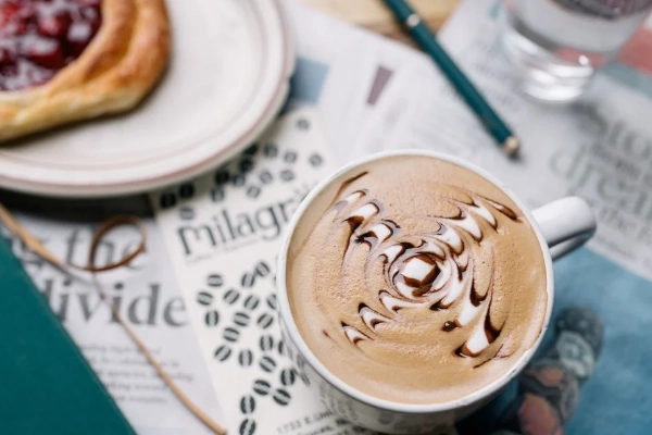 A coffee and a muffin from Milagros Coffee House