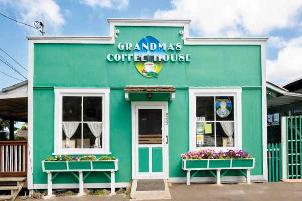 A cup of Kona coffee and a slice of banana bread from Grandma’s Coffee House