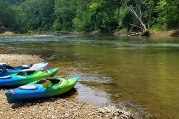 People kayaking on the calm Green River