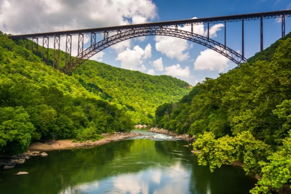 The iconic New River Gorge Bridge soaring high above the river