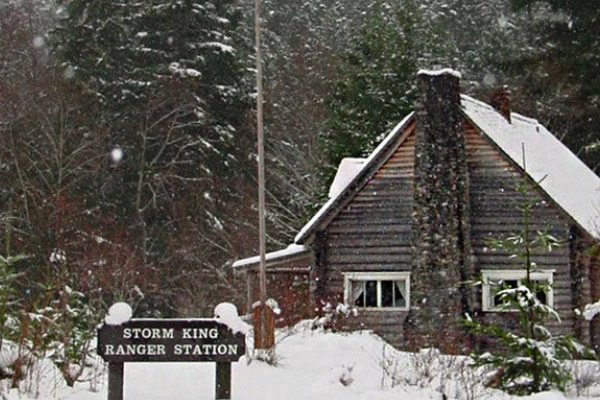 A historic pioneer relic ranger cabin tucked away near a lake