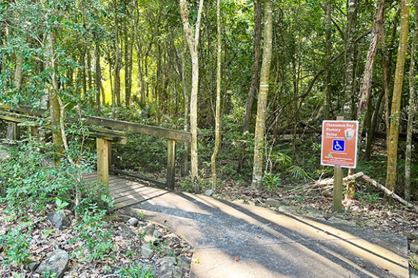 A unique trail marker made of coral guiding hikers