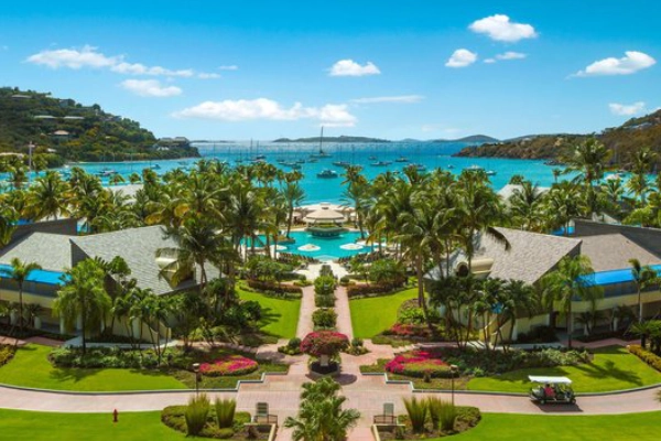 A comfortable coastal resort with a large pool and ocean views