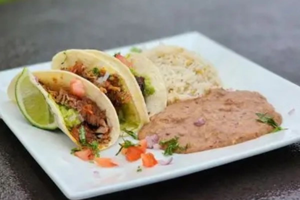 Hearty caribou tacos served at a rustic roadhouse